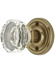 Classic Rosette Door Set with Lowell Crystal Glass Knobs in Antique Brass.